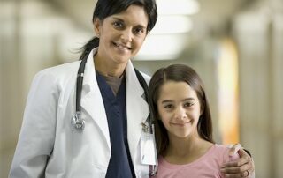 female pediatrician with girl